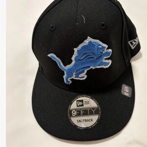 New Era Black Cap with Blue Lion Emblem